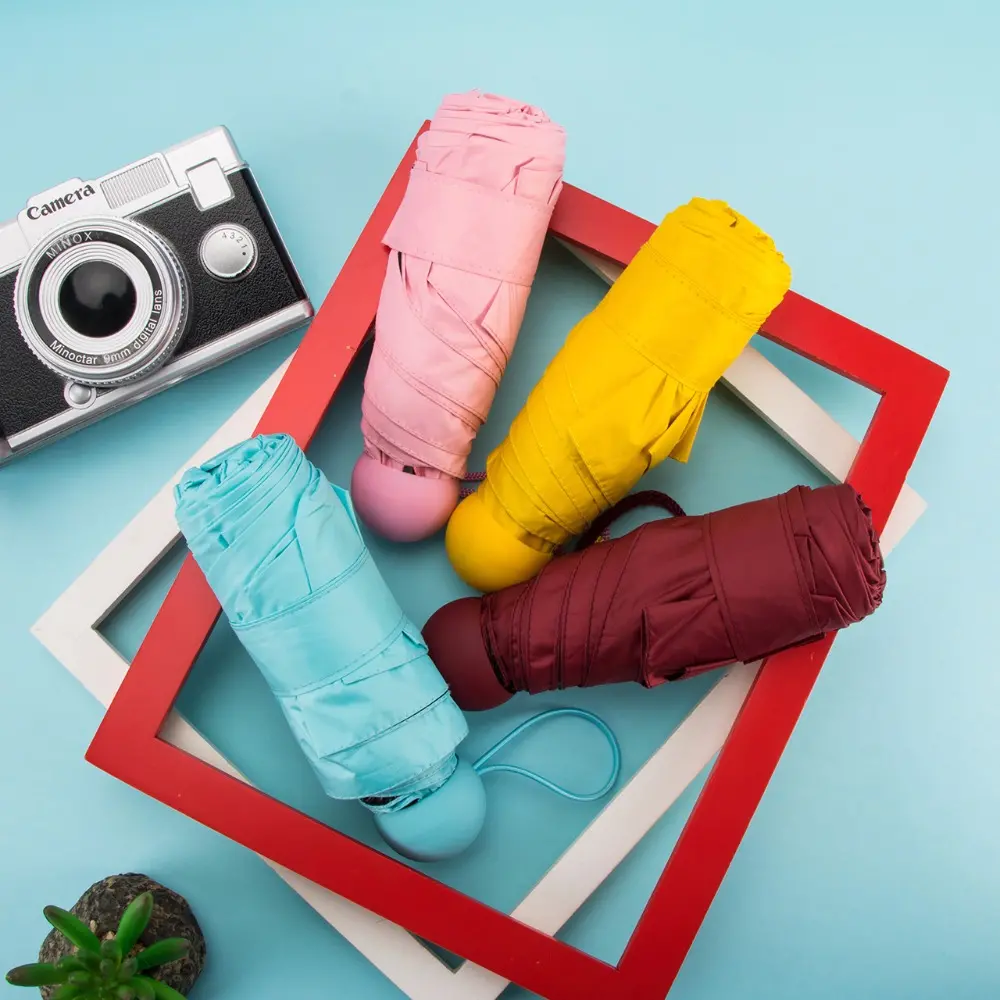 Honana HN-KU4 compressed mini pocket capsule umbrella ultra-light ultra-small waterproof UV rain umbrellas
