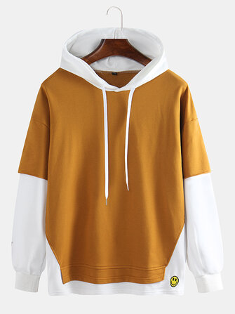 Pullover in cotone sciolto sportivo casual con cappuccio abbinato al colore