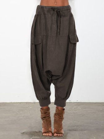 Przyczynowe luźne spodnie z harem w talii