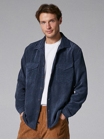 Camisas de color sólido con bolsillo grande de pana vendimia para hombre